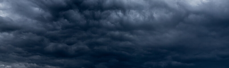 sky with dark clouds and sun light. Nature background of sky	