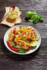 taco shells with shrimps on a plate