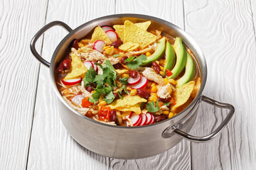 Mexican tortilla soup with chicken, top view