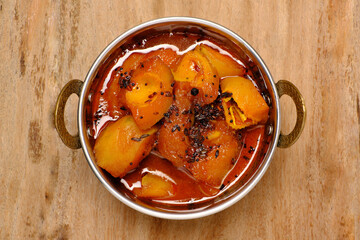 Green Raw mango curry in Indian or Rajasthani style