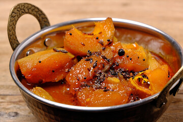 Green Raw mango curry in Indian or Rajasthani style