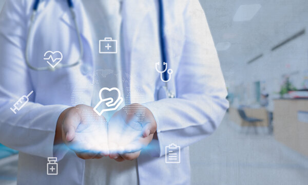 Medical Doctor holding A World globe in Her hands as medical network concept in hand touching icon medical network connection with modern virtual screen interface, medical technology network concept.