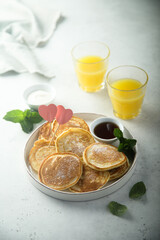 Traditional homemade pancakes with syrup