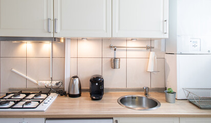 blurred kitchen interior and desk space