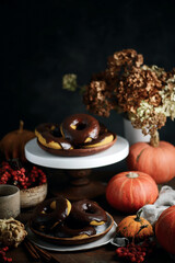 Pumpkin donuts with nutella glaze.