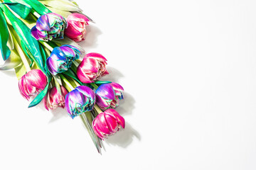A bouquet of unusual multicolored tulips isolated on white background