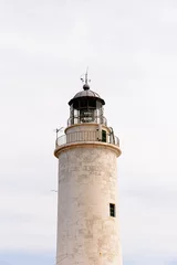 Zelfklevend Fotobehang closeup of a lighthouse with white background © MinekPSC