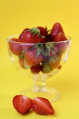 strawberries in glass bowl