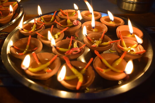 A picture of lit Diya on the festival of Diwali, an important festival of Hindus. It is customary to light candles on Diwali.