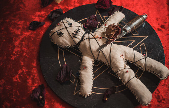 Voodoo Magic. Witchcraft with a doll. Concept of magic.	