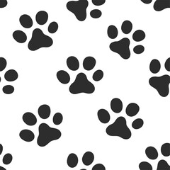 Pet tracks. The paws of a cat or dog. Seamless background.