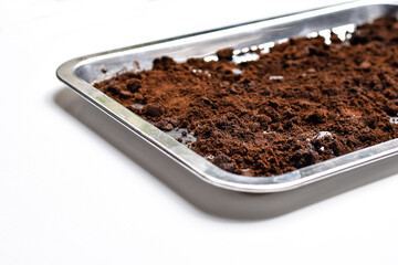 Coffee grounds dried in the sunlight