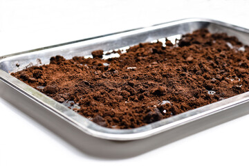 Coffee grounds dried in the sunlight