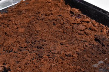 Coffee grounds dried in the sunlight