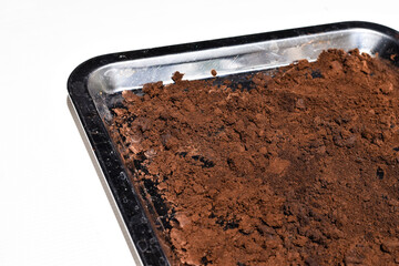 Coffee grounds dried in the sunlight