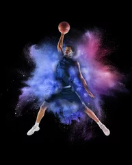 Fototapeten One young sportsman basketball player in explosion of colored neon powder isolated on black background © master1305