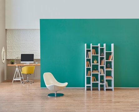 Green wall room, working table and computer, bookshelf sofa with plant interior style.