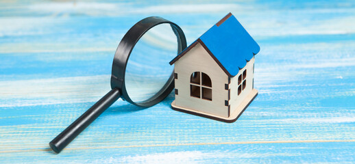 magnifier and house. home search concept. home inspection