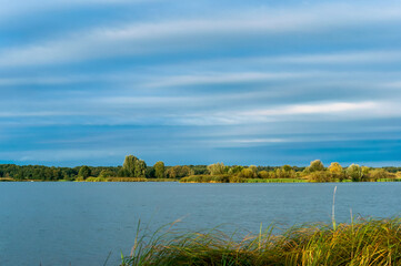 Lake of the Woods. A natural body of water in summer. Spring on the river.