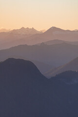 Sunset over the alps during spring near the city of Como, Italy - May 2021.