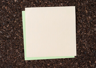 note paper on cork board background with copy space for text