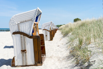beautiful beach chair in the sand on a sunny, relaxed day on the coast of Mecklenburg Western...