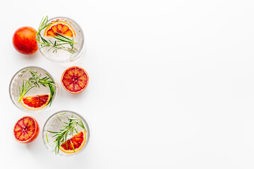 Citrus sangria or lemonade with blood red oranges and ice