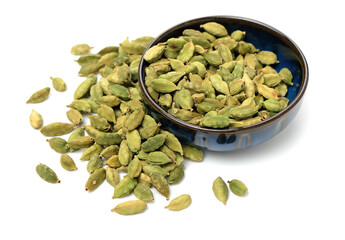 Green cardamom pods on white background
