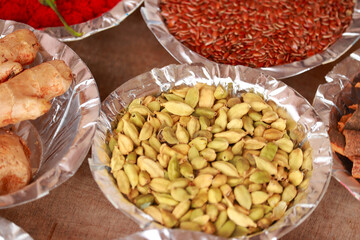 Variety of spice and herbs on table,dark and white table of colorful spices,Traditional Asian seasoning in white bowl,Indian spices