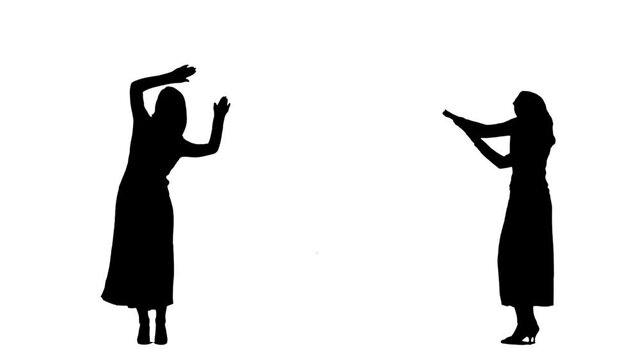 Black silhouette of a young woman in a long dress with heels, dancing and waving her hands. 2 in 1 Collage Front and side view full length on white background. Slow motion ready 59.94fps.