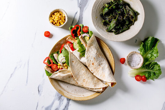 Traditional mexican tortila wrap with pork meat