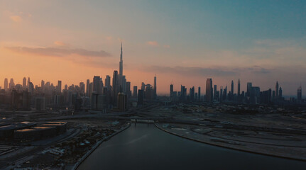 Fototapeta na wymiar AERIAL. Top view of downtown Dubai at beautiful sunset, United Arab Emirates.