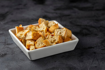 Delicious crunchy croutons on the table.