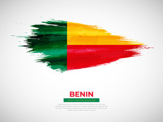 Obraz premium Grunge style brush painted Benin country flag illustration with Independence day typography