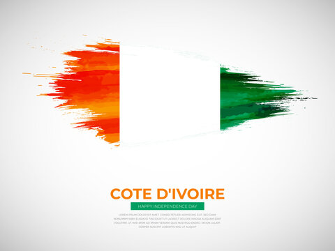 Grunge style brush painted Cote d'Ivoire country flag illustration with Independence day typography