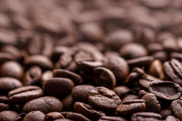 Roasted coffee beans. Background and macro