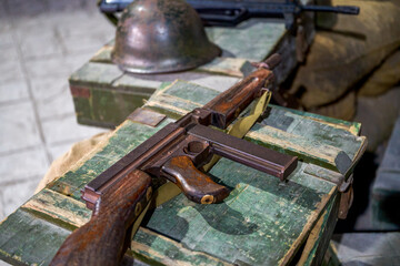 A close-up of the assault rifle model in the military summer camp