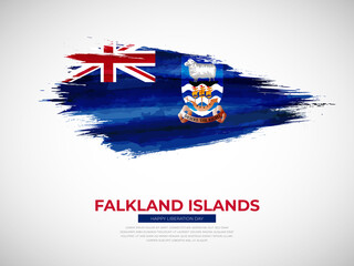 Grunge style brush painted Falkland Islands country flag illustration with liberation day typography