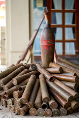 Close-up of mortars and shells in a military summer camp