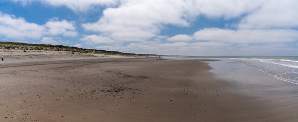 wide empty golden sand beach on the Wadden Sea coast of western Denmark