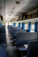 Fototapeta premium A close-up of the interior of an abandoned train passenger carriage seat