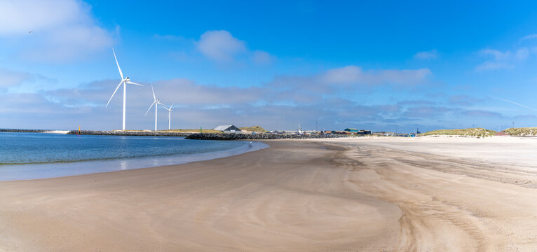 wind turbines and the harbor at Hvinde Sande on the coast of western Denmark