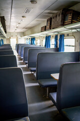 Fototapeta premium A close-up of the interior of an abandoned train passenger carriage seat