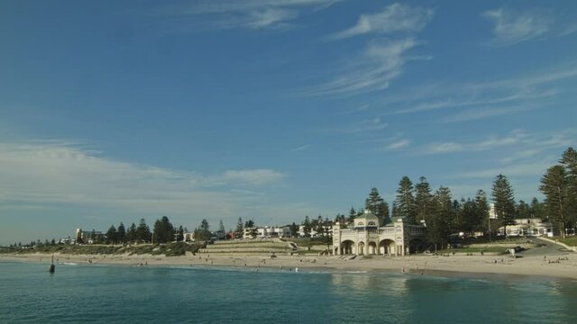 Timelapse of Cottesoe Beach in Perth, Western Australia under blue skies.
