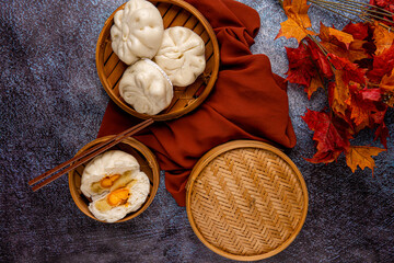 Baozi or Bakpao is a type of yeast-leavened filled bun in various Chinese cuisines. There are many variations in fillings (meat or vegetarian) and preparations, though the buns are most often steamed.