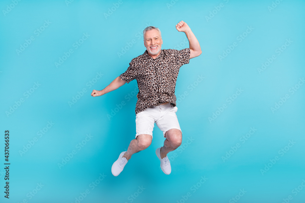 Sticker full length photo of cheerful happy old man jump up air wear casual summer outfit isolated on blue c