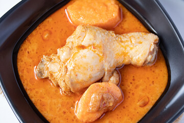 Chicken Mussaman Curry in black cups