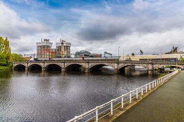 Fototapeta premium A view towards the Caledonian Railway Bridge in Glasgow on a summers day