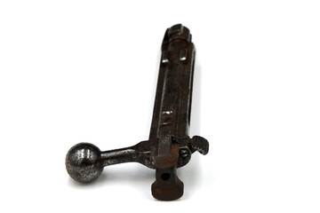 old rifle bolt on white background
