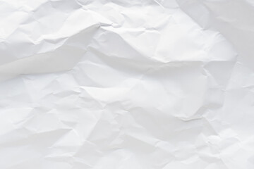 White crumpled paper texture background.